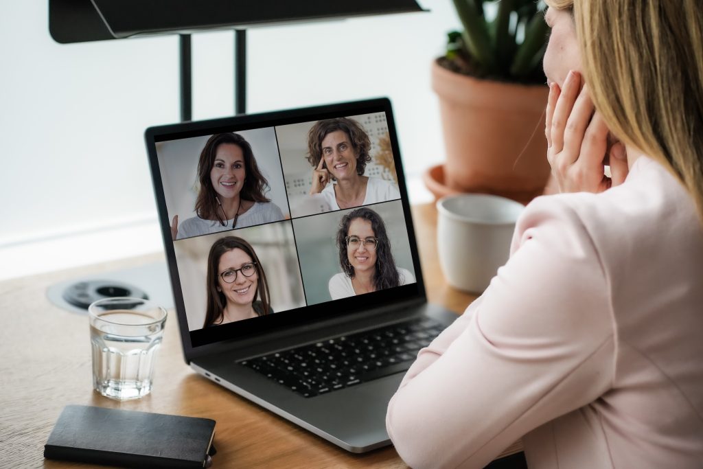 senior living advisor meeting with clients and care providers on a zoom call to discuss the best care options for a client. 